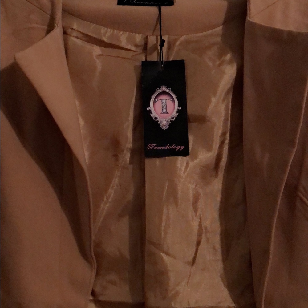 Tan cape jacket